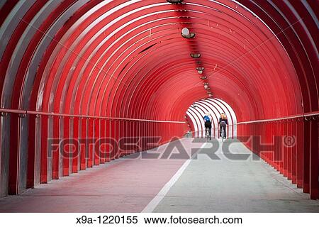 Red Tunnel with Two Cyclists at the SECC in Glasgow, Scotland View Large Photo Image Stock Photography - Red Tunnel with Two Cyclists at the SECC in Glasgow, Scotland. Fotosearch