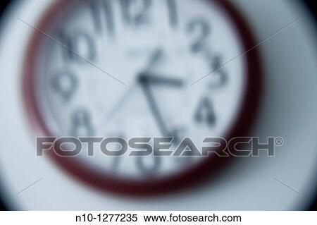 Stock Photography - Red wall clock. Fotosearch