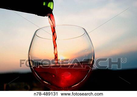 Red wine in wineglass View Large Photo Image Stock Image - Red wine in wineglass. Fotosearch