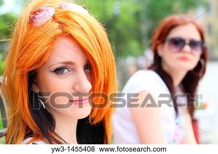 redhead women outdoors in the street View Large Photo Image Stock Photo - redhead women outdoors in the street. Fotosearch