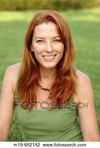 Redheaded girl with green eyes View Large Photo Image Stock Image - Redheaded girl with green eyes. Fotosearch