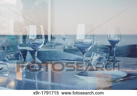 Reflected sea on a restaurant's window Denia Alicante Spain View Large Photo Image Stock Photography - Reflected sea on a restaurant's window Denia Alicante Spain. Fotosearch