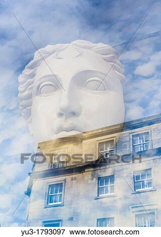 Reflection of building on classical style mask in shop window, High Street, Oxford, England, UK View Large Photo Image Stock Photo - Reflection of building on classical style mask in shop window, High Street, Oxford, England, UK. Fotosearch