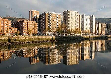 Reflection of buildings on the river Nervion. Bilbao. Vizcaya. Basque Country. Spain. Europe. View Large Photo Image Stock Photo - Reflection of buildings on the river Nervion. Bilbao. Vizcaya. Basque Country. Spain. Europe.. Fotosearch