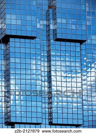 Reflections in windows of high rise office building, Canary Wharf, London, UK. View Large Photo Image Stock Photo - Reflections in windows of high rise office building, Canary Wharf, London, UK.. Fotosearch