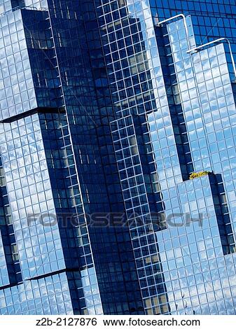 Reflections in windows of high rise office building, Canary Wharf, London, UK. View Large Photo Image Stock Photograph - Reflections in windows of high rise office building, Canary Wharf, London, UK.. Fotosearch