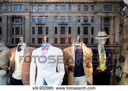 Stock Photography - Reflections on a boutique shop window, Regent street, Westminster, London, England, United Kingdom. Fotosearch