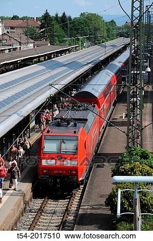 Regional train of German Bahn AG in the main station of Freiburg im Breisgau View Large Photo Image Stock Image - Regional train of German Bahn AG in the main station of Freiburg im Breisgau. Fotosearch