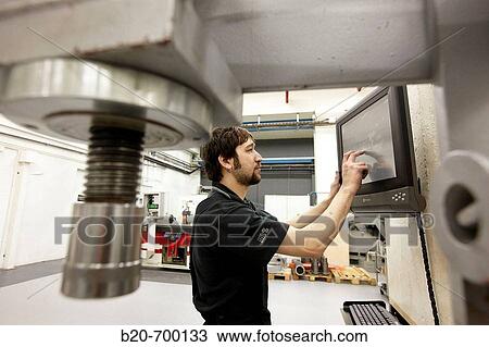 Stock Image - Registration control in production by imaging on touch screen, spindle manufacturing. Mendaro, Gipuzkoa, Euskadi, Spain. Fotosearch