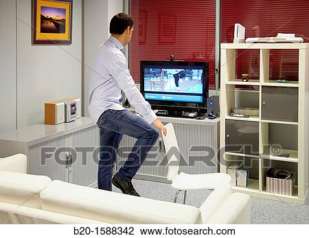 Rehabilitation exercises using videos View Large Photo Image Stock Image - Rehabilitation exercises using videos. Fotosearch