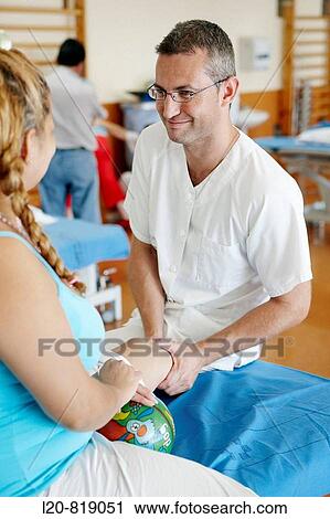 Rehabilitation, massaging amputated leg. Hospital Universitario de Gran Canaria Doctor Negrin, Las Palmas de Gran Canaria. Canary Islands, Spain View Large Photo Image Stock Image - Rehabilitation, massaging amputated leg. Hospital Universitario de Gran Canaria Doctor Negrin, Las Palmas de Gran Canaria. Canary Islands, Spain. Fotosearch