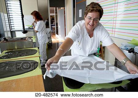 Picture - Rehabilitation, physiotherapy, mud therapy. Hospital Universitario Gran Canaria Doctor Negrin, Las Palmas de Gran Canaria. Canary Islands, Spain. Fotosearch