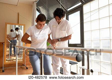 Rehabilitation, physiotherapy, parallel bars. Hospital Universitario Gran Canaria Doctor Negrin, Las Palmas de Gran Canaria. Canary Islands, Spain View Large Photo Image Stock Photo - Rehabilitation, physiotherapy, parallel bars. Hospital Universitario Gran Canaria Doctor Negrin, Las Palmas de Gran Canaria. Canary Islands, Spain. Fotosearch