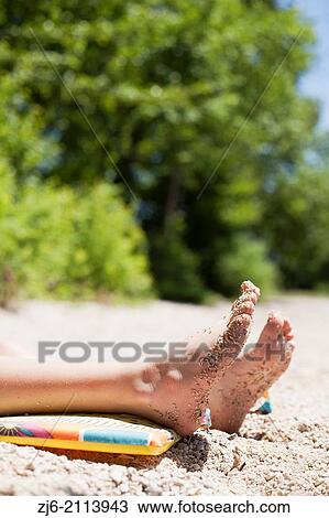 Relaxation by the lake of Bohinj, Slovenia. View Large Photo Image Stock Image - Relaxation by the lake of Bohinj, Slovenia.. Fotosearch