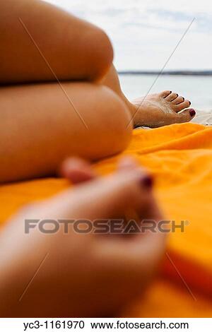 Relaxing at the beach View Large Photo Image Stock Image - Relaxing at the beach. Fotosearch
