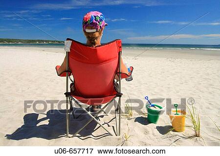 relaxing at the beach View Large Photo Image Stock Photo - relaxing at the beach. Fotosearch