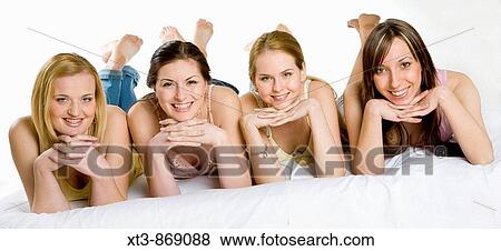 Stock Photo - relaxing friends. Fotosearch