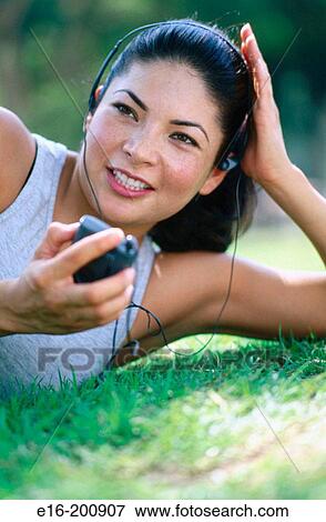 relaxing listening to music View Large Photo Image Stock Photo - relaxing listening to music. Fotosearch