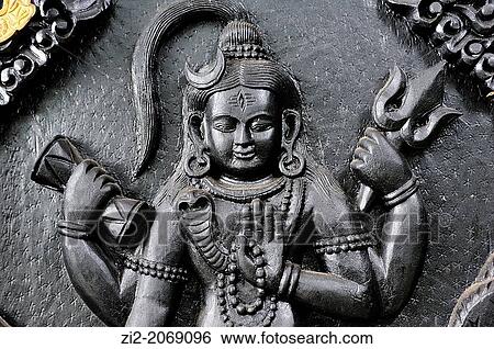 Relief depicting the Hindu god Shiva, Binde Basini temple, Pokhara, Nepal View Large Photo Image Stock Photograph - Relief depicting the Hindu god Shiva, Binde Basini temple, Pokhara, Nepal. Fotosearch