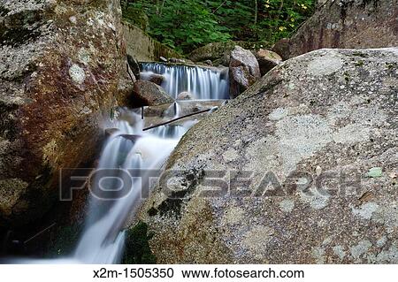 Remnants of old dam along Lafayette Brook during the summer months at Lafayette Brook Scenic Area in the White Mountains, New Hampshire USA View Large Photo Image Stock Image - Remnants of old dam along Lafayette Brook during the summer months at Lafayette Brook Scenic Area in the White Mountains, New Hampshire USA. Fotosearch