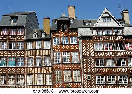 Rennes Brittany France Colourful medieval half timbered buildings on Place du Champ Jacquet View Large Photo Image Stock Image - Rennes Brittany France Colourful medieval half timbered buildings on Place du Champ Jacquet. Fotosearch