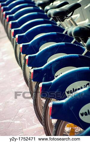 Stock Image - Rent bicycles in Valencia, Spain. Fotosearch