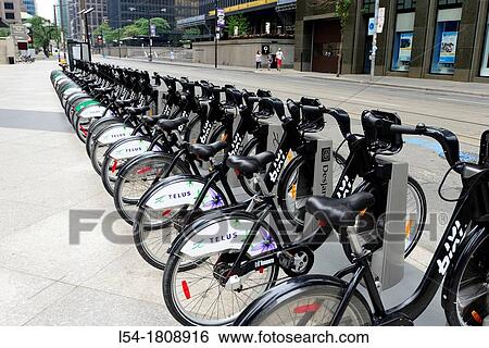 Rental bicycles used for city transportation Toronto Ontario Canada View Large Photo Image Stock Photograph - Rental bicycles used for city transportation Toronto Ontario Canada. Fotosearch