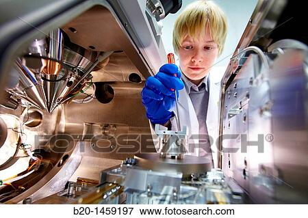 Stock Photo - Replacing the sample holder, FIB Control Pannel, Focused-Ion-Beam Nanofabrication Laboratory, Dual-Beam Focused-Ion-Beam FIB, Helios NanoLabTM DualBeamTM, Nanofabrication Tool, Nano-scale materials fabrication and manipulation. Fotosearch