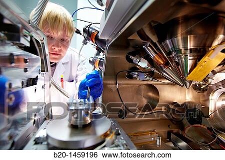 Stock Photograph - Replacing the sample holder, FIB Control Pannel, Focused-Ion-Beam Nanofabrication Laboratory, Dual-Beam Focused-Ion-Beam FIB, Helios NanoLabTM DualBeamTM, Nanofabrication Tool, Nano-scale materials fabrication and manipulation. Fotosearch