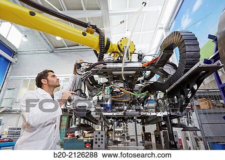 Stock Photo - Research and development for the design of robotic manufacturing cell to work in aircraft component. Industry and Transport. Research & innovation.. Fotosearch
