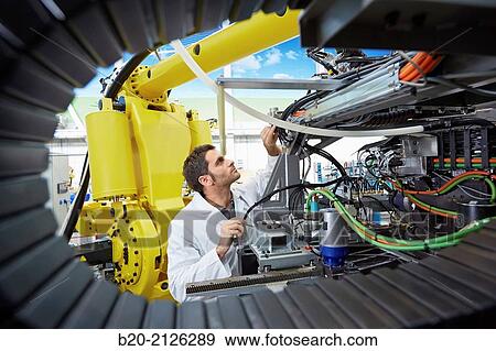 Stock Photo - Research and development for the design of robotic manufacturing cell to work in aircraft component. Industry and Transport. Research & innovation.. Fotosearch