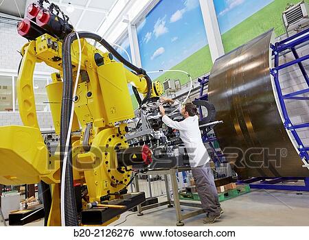Stock Photograph - Research and development for the design of robotic manufacturing cell to work in aircraft component.. Fotosearch