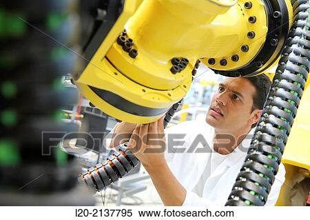 Stock Photography - Research and development for the design of robotic manufacturing cell to work in aircraft component. Industry and Transport. Technology and Research Centre, Technological Park, Donostia, San Sebastian, Gipuzkoa, Basque Country, Spain. Fotosearch