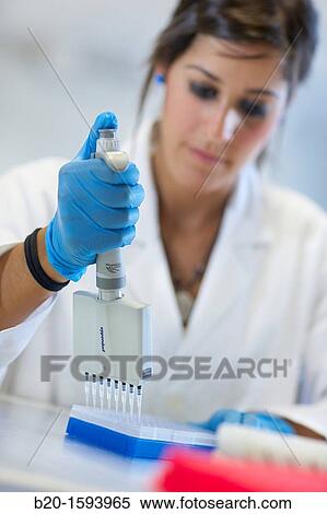 Stock Photography - Researcher handling DNA samples, Biotechnology Laboratory, Health Area, Alava Technology Park, Technology Centre, Tecnalia Research & Innovation, Miano, Araba, Basque Country, Spain. Fotosearch