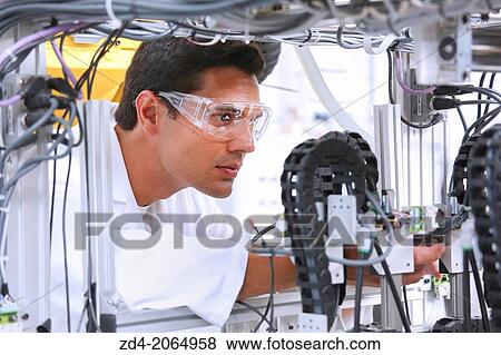Researcher. Industrial Robot System. Tecnacomp Robotic cell manufacturing composite preforms Dry fiber preform manufacturing 3D Industry. View Large Photo Image Stock Photo - Researcher. Industrial Robot System. Tecnacomp Robotic cell manufacturing composite preforms Dry fiber preform manufacturing 3D Industry.. Fotosearch