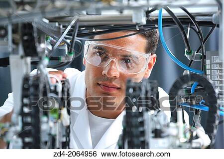Researcher. Industrial Robot System. Tecnacomp Robotic cell manufacturing composite preforms Dry fiber preform manufacturing 3D Industry. View Large Photo Image Stock Photograph - Researcher. Industrial Robot System. Tecnacomp Robotic cell manufacturing composite preforms Dry fiber preform manufacturing 3D Industry.. Fotosearch