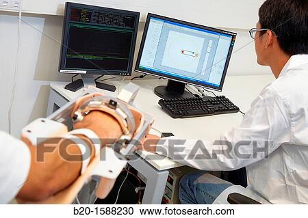 Researcher placing a patient clinical training device of the limb has multiple modes of training wrist and arm View Large Photo Image Stock Image - Researcher placing a patient clinical training device of the limb has multiple modes of training wrist and arm. Fotosearch