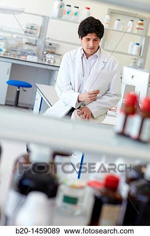 Stock Photo - Researcher, synthesis lab, research laboratory, IkerChem research lab, design and synthesis of new chemical entities with therapeutic applications in oncology, discovery and development of novel drugs for the treatment of cancer. Fotosearch
