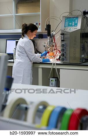 Researcher taking a sample of carotenoid-producing yeast obtained by continued growth in the bioreactor View Large Photo Image Stock Photo - Researcher taking a sample of carotenoid-producing yeast obtained by continued growth in the bioreactor. Fotosearch