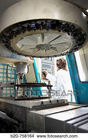Researcher testing Anak-Matic 7 CNC vertical milling machine for incremental sheet forming technology, Fatronik-Tecnalia, Research and Technology Center, Donostia, Basque Country, Spain View Large Photo Image Picture - Researcher testing Anak-Matic 7 CNC vertical milling machine for incremental sheet forming technology, Fatronik-Tecnalia, Research and Technology Center, Donostia, Basque Country, Spain. Fotosearch