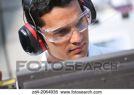 Researcher with glasses and ear protection. View Large Photo Image Stock Photography - Researcher with glasses and ear protection.. Fotosearch