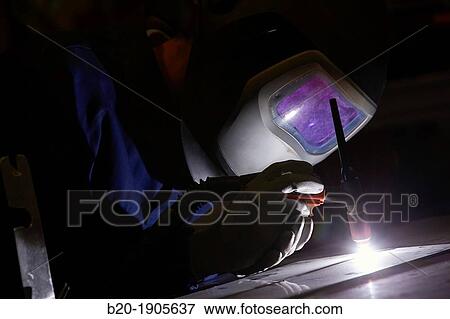 Stock Photo - Researcher with TIG welding equipment, making joints by electrical arc, Industry, Tecnalia Research & innovation, Technology and Research Centre, Miramon Technological Park, San Sebastian, Donostia, Gipuzkoa, Basque Country, Spain. Fotosearch