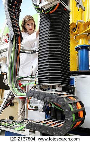 Researcher working on portable robot. Aerospace industry. Technology and Research Center. Miramon Technological Park. San Sebastian. Donostia. Gipuzkoa. Basque Country. Spain. View Large Photo Image Picture - Researcher working on portable robot. Aerospace industry. Technology and Research Center. Miramon Technological Park. San Sebastian. Donostia. Gipuzkoa. Basque Country. Spain.. Fotosearch