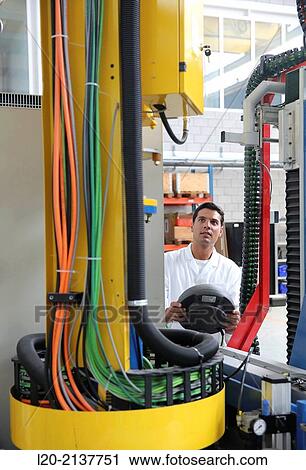 Researcher working on portable robot. Aerospace industry. Technology and Research Center. Miramon Technological Park. San Sebastian. Donostia. Gipuzkoa. Basque Country. Spain. View Large Photo Image Stock Image - Researcher working on portable robot. Aerospace industry. Technology and Research Center. Miramon Technological Park. San Sebastian. Donostia. Gipuzkoa. Basque Country. Spain.. Fotosearch