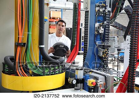 Researcher working on portable robot. Aerospace industry. Technology and Research Center. Miramon Technological Park. San Sebastian. Donostia. Gipuzkoa. Basque Country. Spain. View Large Photo Image Stock Image - Researcher working on portable robot. Aerospace industry. Technology and Research Center. Miramon Technological Park. San Sebastian. Donostia. Gipuzkoa. Basque Country. Spain.. Fotosearch