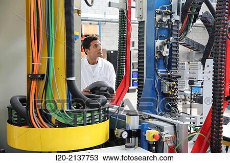 Researcher working on portable robot. Aerospace industry. Technology and Research Center. Miramon Technological Park. San Sebastian. Donostia. Gipuzkoa. Basque Country. Spain. View Large Photo Image Stock Image - Researcher working on portable robot. Aerospace industry. Technology and Research Center. Miramon Technological Park. San Sebastian. Donostia. Gipuzkoa. Basque Country. Spain.. Fotosearch