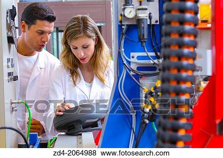Stock Photo - Researcher working on portable robot. Tecnalia Research & innovation. Technology and Research Center. Miramon Technological Park. San Sebastian. Donostia. Gipuzkoa. Basque Country. Spain.. Fotosearch