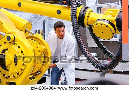 Researcher working on robot. Tecnalia Research & innovation. Technology and Research Center. Miramon Technological Park. San Sebastian. Donostia. Gipuzkoa. Basque Country. Spain. View Large Photo Image Picture - Researcher working on robot. Tecnalia Research & innovation. Technology and Research Center. Miramon Technological Park. San Sebastian. Donostia. Gipuzkoa. Basque Country. Spain.. Fotosearch
