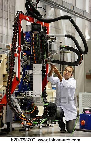 Researcher working on Roptalmu portable robot to drill holes into aircraft components, Fatronik-Tecnalia, Research and Technology Center, Donostia, Basque Country, Spain View Large Photo Image Stock Image - Researcher working on Roptalmu portable robot to drill holes into aircraft components, Fatronik-Tecnalia, Research and Technology Center, Donostia, Basque Country, Spain. Fotosearch