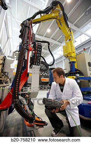 Researcher working on Roptalmu portable robot to drill holes into aircraft components, Fatronik-Tecnalia, Research and Technology Center, Donostia, Basque Country, Spain View Large Photo Image Stock Image - Researcher working on Roptalmu portable robot to drill holes into aircraft components, Fatronik-Tecnalia, Research and Technology Center, Donostia, Basque Country, Spain. Fotosearch
